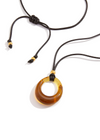 Black Cord Necklace with a brown amber pendant on a white background