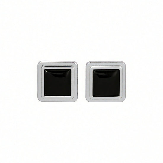 Pair of silver square stud earrings with black centers on a white background