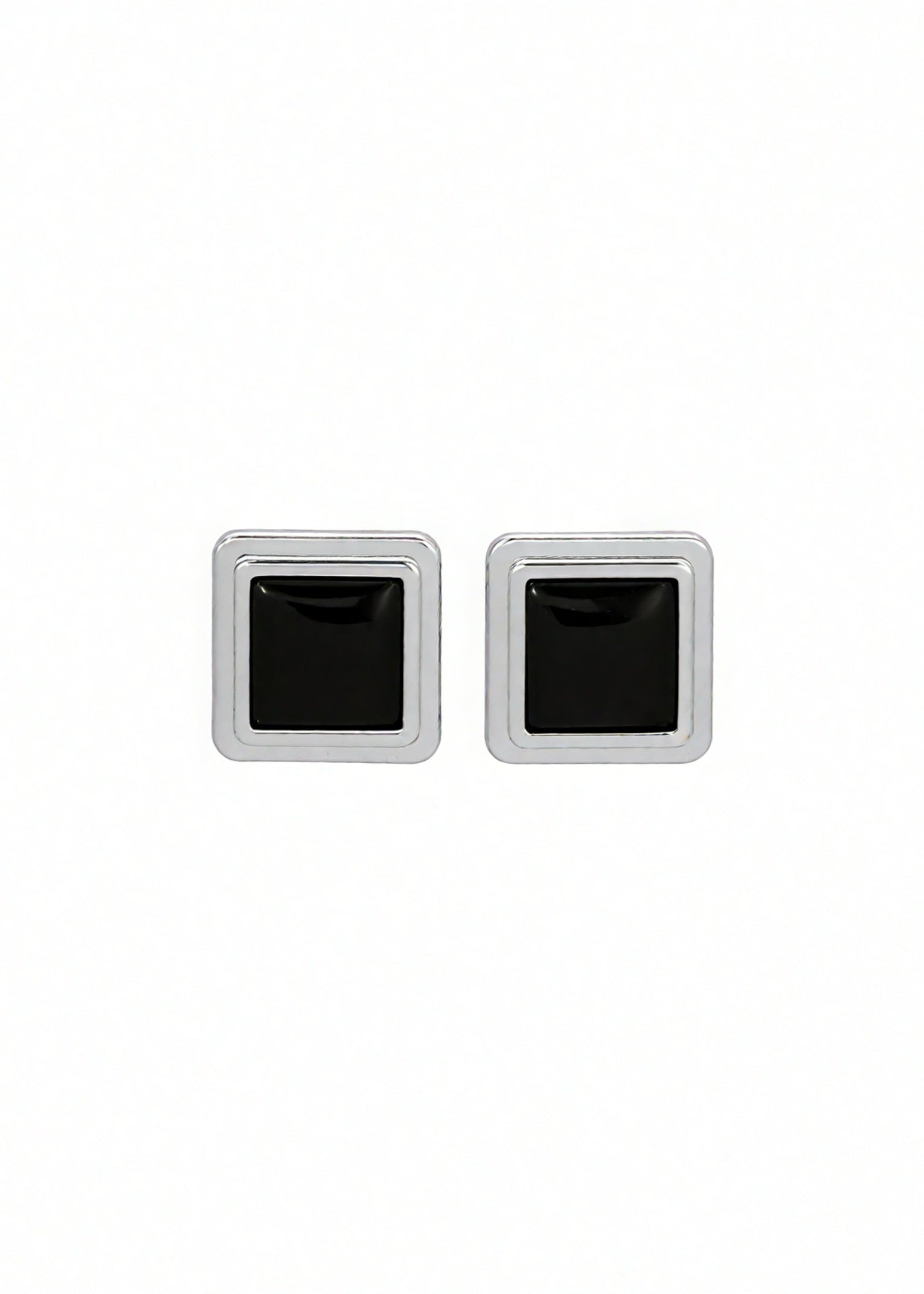 Pair of silver square stud earrings with black centers on a white background