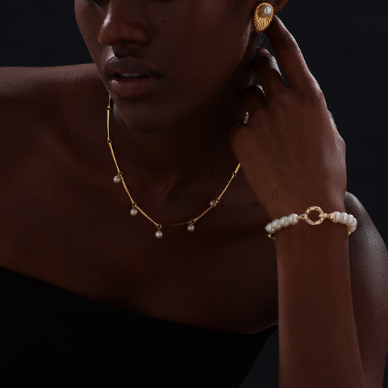 Oval Textured Stud Earrings Inlaid with Pearl - Earrings - ONNNIII