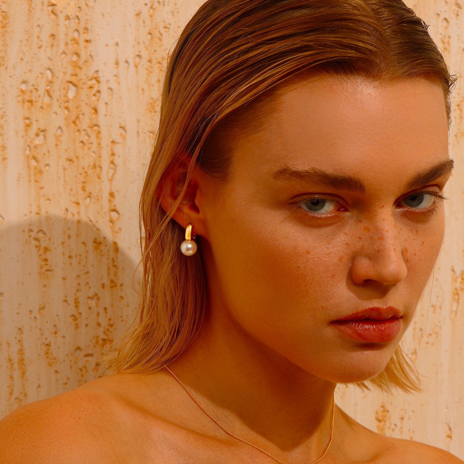Pearl Huggie Earrings - Earrings - ONNNIII