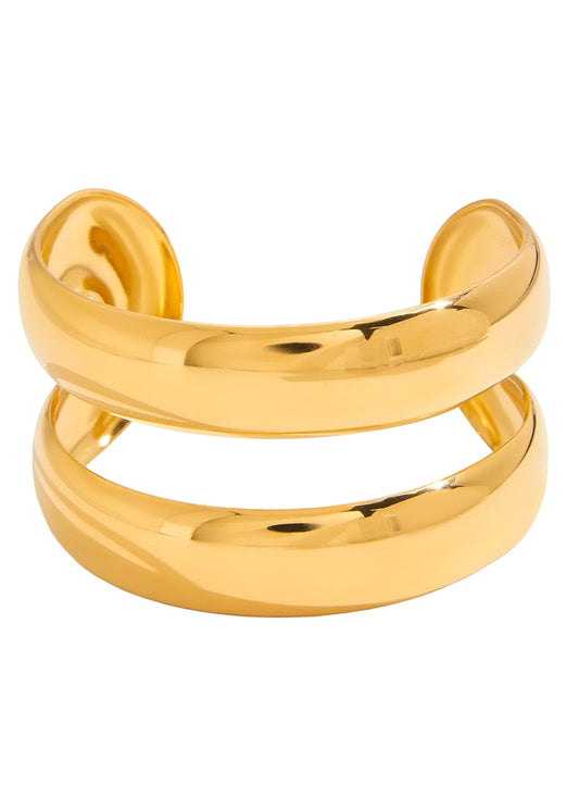 Gold open-toe ring on a white background