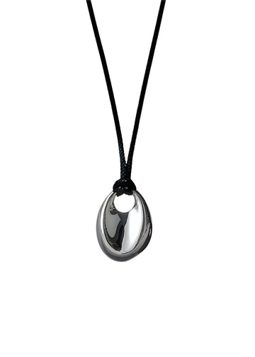 Black necklace with a silver pendant on a white background