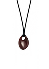 Brown red pendant on a black cord against a white background