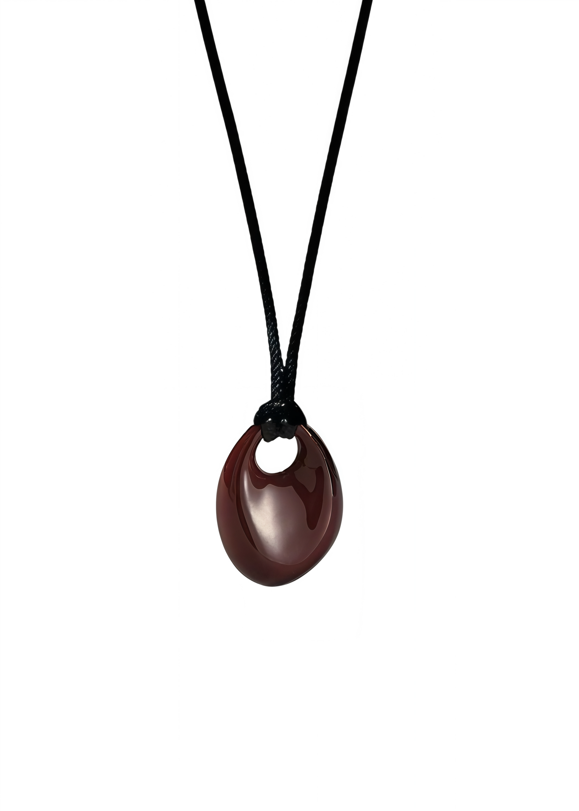Brown red pendant on a black cord against a white background