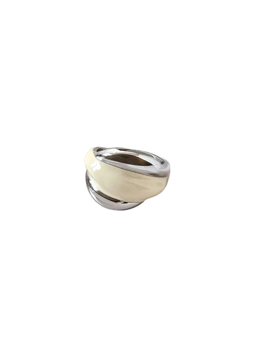 Silver and cream white ring on a white background