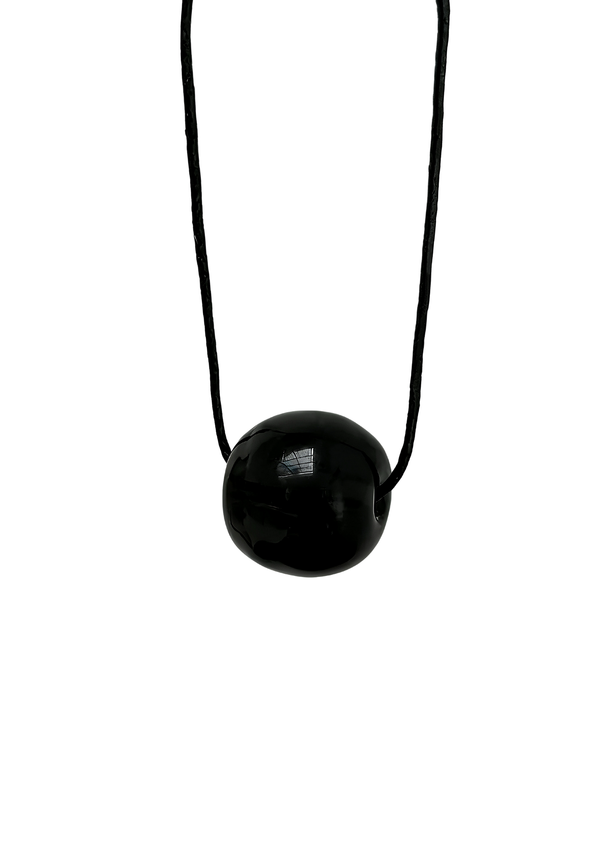 Black necklace with a round pendant on a white background