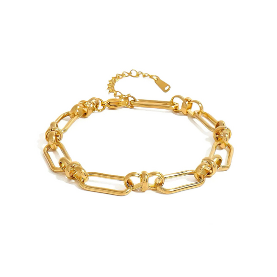 Gold chain bracelet on a white background